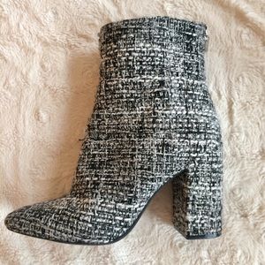 Black and white tweed ankle booties.